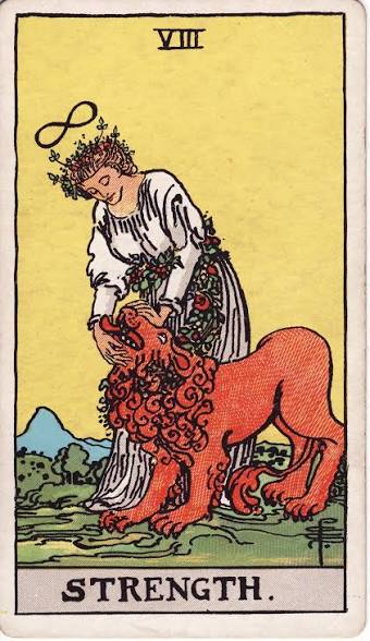 The Strength tarot card: a woman crowned with flowers gently holding a red lion